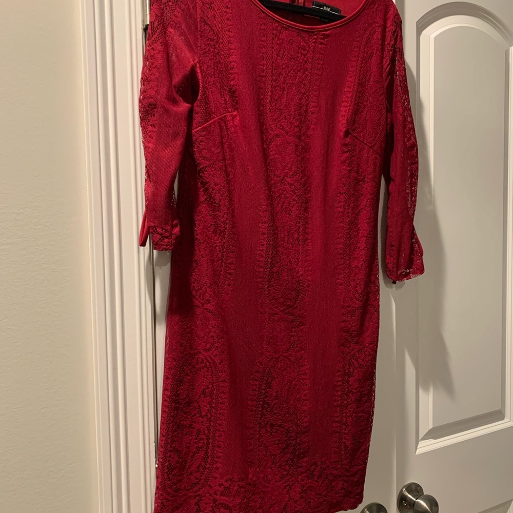 R&K Red cocktail dress size 8 with sheer sleeves, reaches just above knee